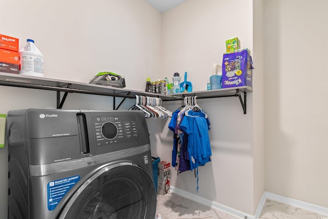 736 Flowering Branch Ave, Little River, SC 29566 - laundry area featuring washer / dryer and marble look tiles