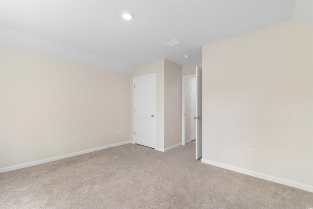 736 Flowering Branch Ave, Little River, SC 29566 - empty room featuring vaulted ceiling, light colored carpet, and recessed lighting