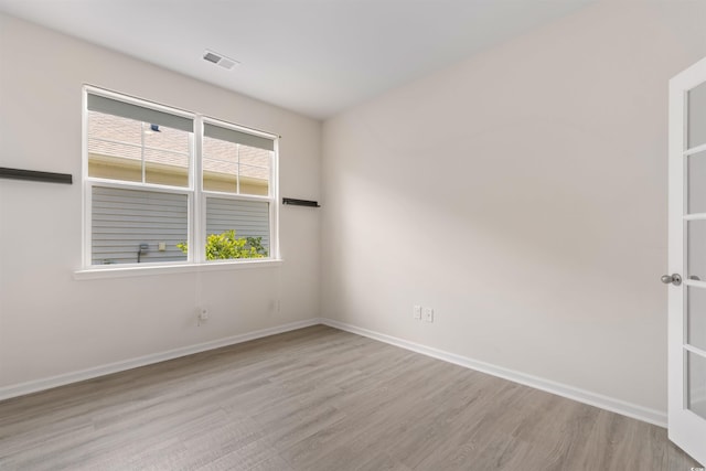 736 Flowering Branch Ave, Little River, SC 29566 - unfurnished room with baseboards and wood finished floors