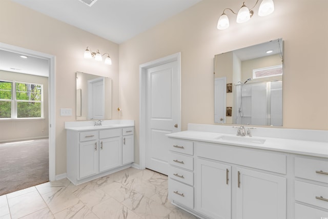 736 Flowering Branch Ave, Little River, SC 29566 - bathroom with two vanities, marble finish floors, and a shower with shower door