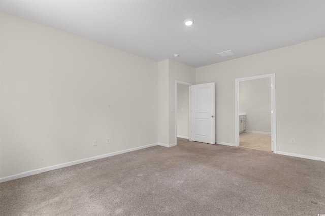 736 Flowering Branch Ave, Little River, SC 29566 - unfurnished bedroom featuring carpet flooring, ensuite bath, and recessed lighting