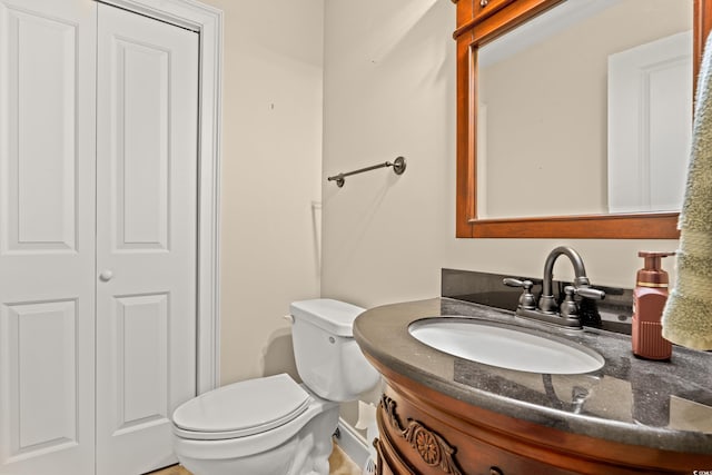 2019 Ye Olde Kings Hwy, North Myrtle Beach, SC 29582 - half bathroom with vanity, toilet, and a closet