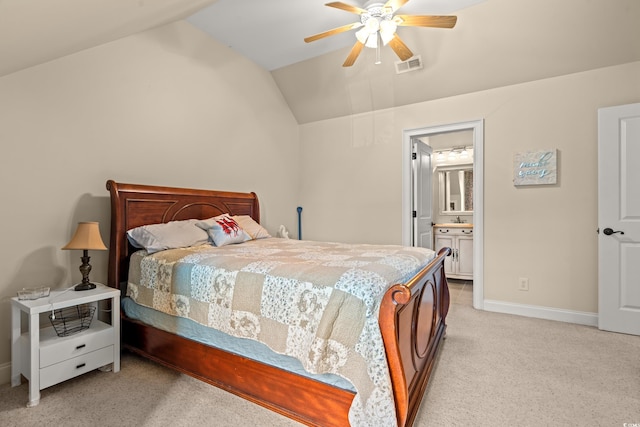 2019 Ye Olde Kings Hwy, North Myrtle Beach, SC 29582 - bedroom featuring vaulted ceiling, light carpet, baseboards, ceiling fan, and ensuite bathroom