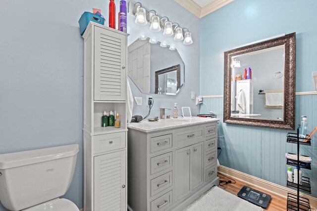 2019 Ye Olde Kings Hwy, North Myrtle Beach, SC 29582 - bathroom with toilet, crown molding, vanity, and wood finished floors