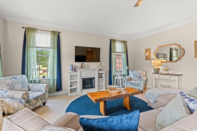 2019 Ye Olde Kings Hwy, North Myrtle Beach, SC 29582 - living room featuring ornamental molding, carpet flooring, a fireplace, baseboards, and a ceiling fan