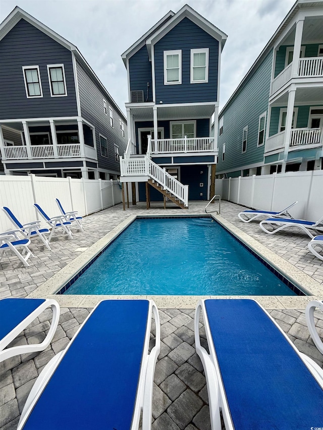 113B 11th Ave S, Surfside Beach, SC 29575 - community pool featuring a patio and stairway