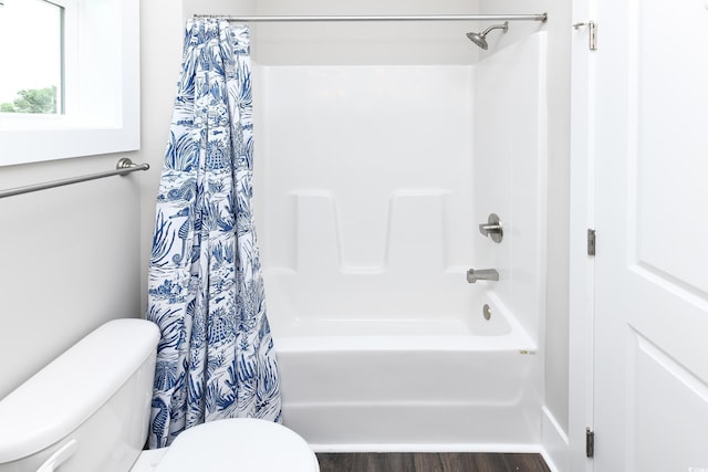113B 11th Ave S, Surfside Beach, SC 29575 - bathroom with shower / bath combo with shower curtain and wood finished floors