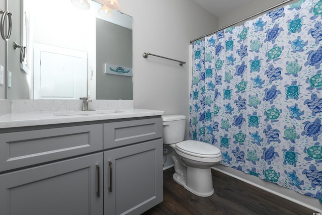 113B 11th Ave S, Surfside Beach, SC 29575 - full bathroom featuring wood finished floors, vanity, and curtained shower