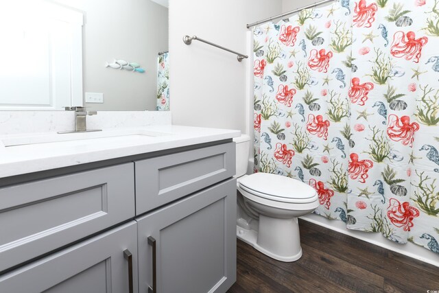 113B 11th Ave S, Surfside Beach, SC 29575 - full bath with vanity, wood finished floors, and a shower with shower curtain