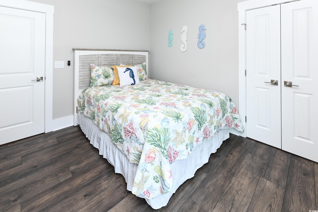 113B 11th Ave S, Surfside Beach, SC 29575 - bedroom featuring dark wood-style flooring and a closet