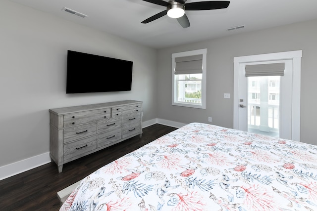 113B 11th Ave S, Surfside Beach, SC 29575 - bedroom featuring dark wood-style floors and a ceiling fan