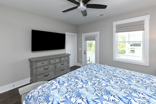 113B 11th Ave S, Surfside Beach, SC 29575 - bedroom with access to exterior, dark wood-type flooring, and ceiling fan