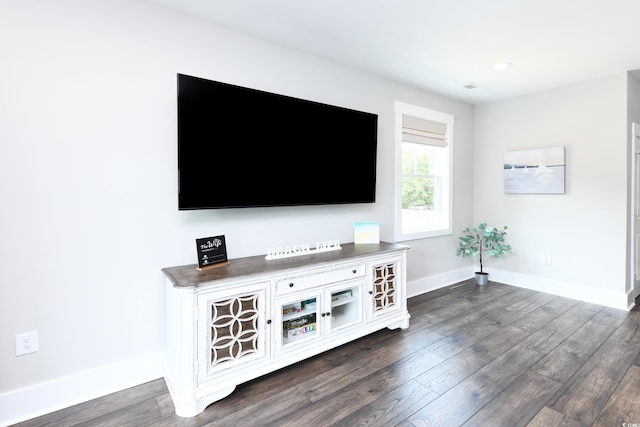 113B 11th Ave S, Surfside Beach, SC 29575 - living area with baseboards and dark wood finished floors
