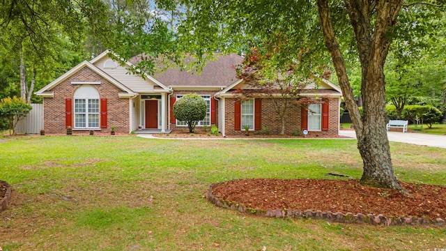 view of front of house featuring brick siding
