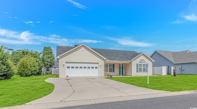 125 Balsa Dr, Longs, SC 29568 - single story home featuring a garage, concrete driveway, and roof with shingles