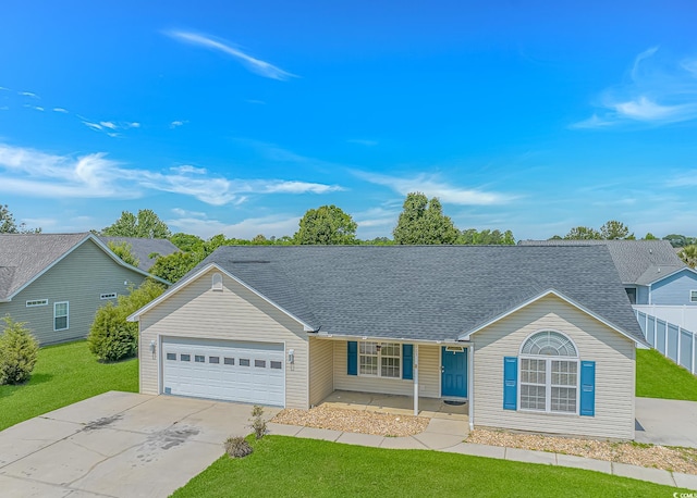 125 Balsa Dr, Longs, SC 29568 - ranch-style home with a porch, an attached garage, driveway, and roof with shingles