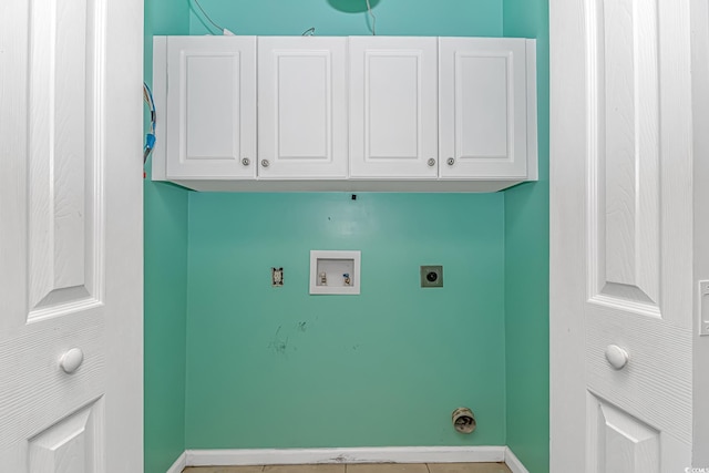 laundry room with hookup for a washing machine, electric dryer hookup, cabinet space, and baseboards