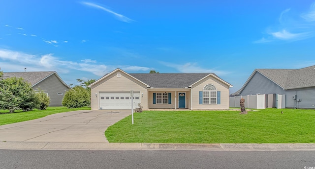 ranch-style house featuring an attached garage, concrete driveway, and a front lawn
