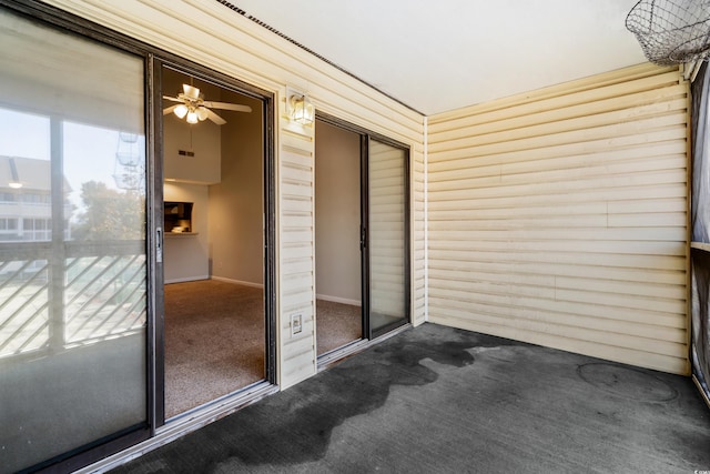 1100 Possum Trot Rd Unit B202, North Myrtle Beach, SC 29582 - unfurnished sunroom featuring a ceiling fan