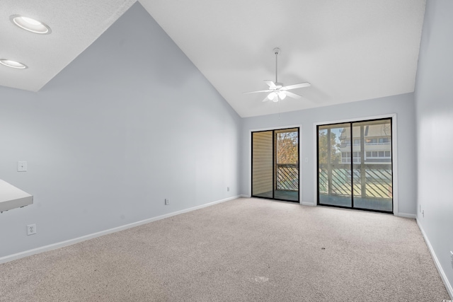 1100 Possum Trot Rd Unit B202, North Myrtle Beach, SC 29582 - carpeted spare room featuring ceiling fan, baseboards, and high vaulted ceiling