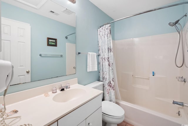 bathroom featuring toilet, shower / tub combo, and vanity