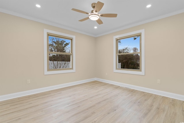unfurnished room with plenty of natural light, light wood-style floors, crown molding, recessed lighting, and a ceiling fan
