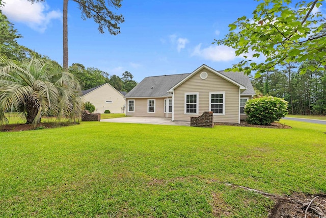 3 Birdsong Ct, Murrells Inlet, SC 29576 - rear view of house featuring a patio area and a lawn