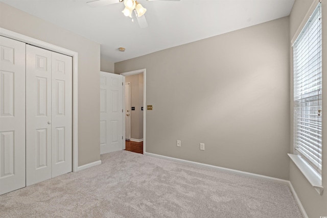 3 Birdsong Ct, Murrells Inlet, SC 29576 - unfurnished bedroom with carpet, a closet, baseboards, and ceiling fan