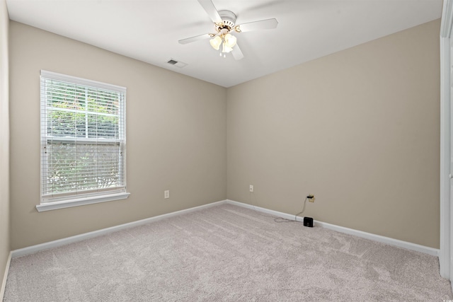 3 Birdsong Ct, Murrells Inlet, SC 29576 - spare room featuring light colored carpet, baseboards, and a ceiling fan