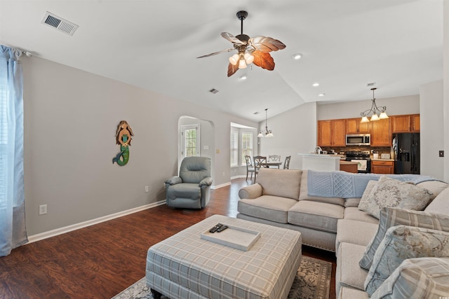 3 Birdsong Ct, Murrells Inlet, SC 29576 - living area with dark wood-style flooring, arched walkways, lofted ceiling, baseboards, and a ceiling fan