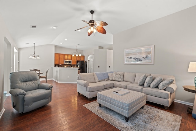 3 Birdsong Ct, Murrells Inlet, SC 29576 - living room with vaulted ceiling, ceiling fan, a chandelier, arched walkways, and dark wood-style flooring