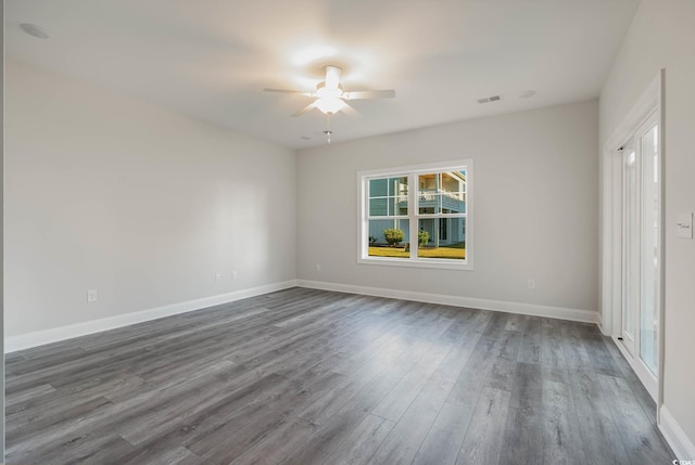 61 Yale Pl, Pawleys Island, SC 29585 - unfurnished room with ceiling fan, dark wood-type flooring, and baseboards