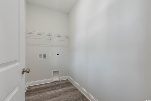 61 Yale Pl, Pawleys Island, SC 29585 - laundry area featuring electric dryer hookup, hookup for a washing machine, dark wood-type flooring, and baseboards
