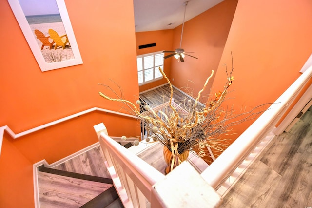 990 Palisade Cir, Myrtle Beach, SC 29577 - staircase featuring high vaulted ceiling, wood finished floors, ceiling fan, and baseboards