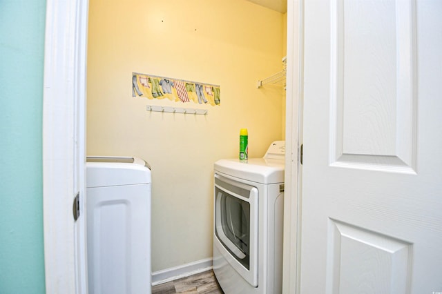 990 Palisade Cir, Myrtle Beach, SC 29577 - washroom featuring washing machine and dryer and wood finished floors