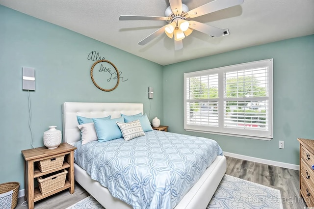 990 Palisade Cir, Myrtle Beach, SC 29577 - bedroom featuring wood finished floors, baseboards, and a ceiling fan