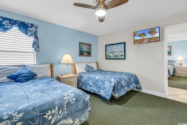 1690 N Waccamaw Dr Unit 103, Garden City Beach, SC 29576 - carpeted bedroom featuring ceiling fan and baseboards