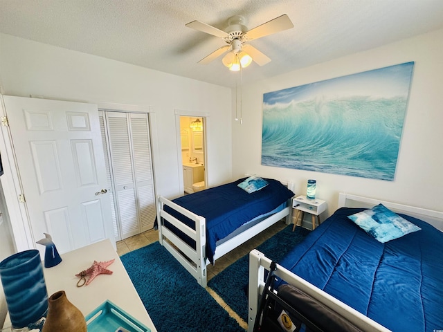 4783 Wild Iris Dr Unit 101, Myrtle Beach, SC 29577 - bedroom featuring tile patterned flooring, a closet, and a ceiling fan