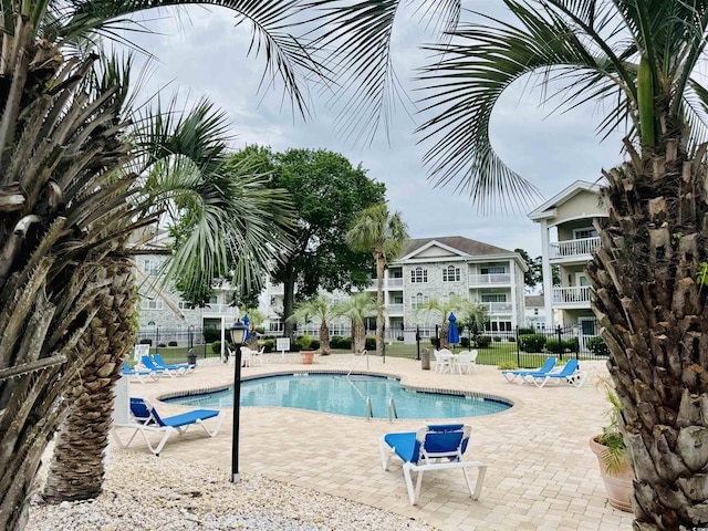 4783 Wild Iris Dr Unit 101, Myrtle Beach, SC 29577 - community pool with a patio