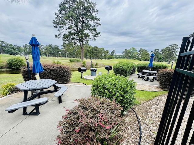 4783 Wild Iris Dr Unit 101, Myrtle Beach, SC 29577 - view of community featuring a patio area and a yard