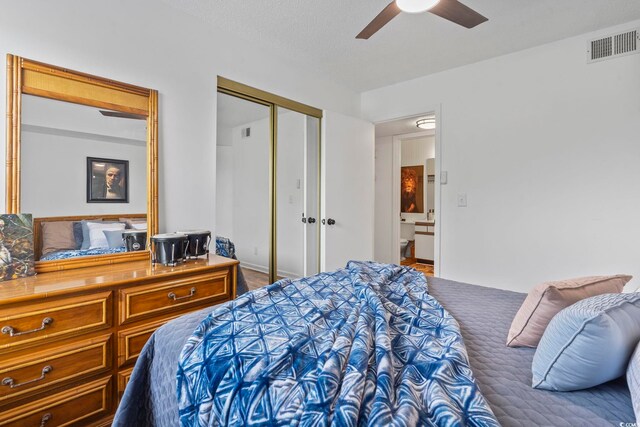 8862 Duckview Dr Unit E, Surfside Beach, SC 29575 - bedroom featuring a closet and a ceiling fan