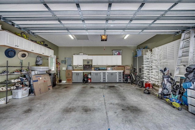 1204 Pine Valley Rd, North Myrtle Beach, SC 29582 - garage featuring a garage door opener