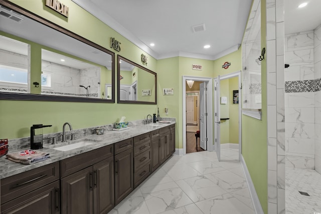 full bathroom with marble look tile flooring, a walk in shower, double vanity, baseboards, and recessed lighting