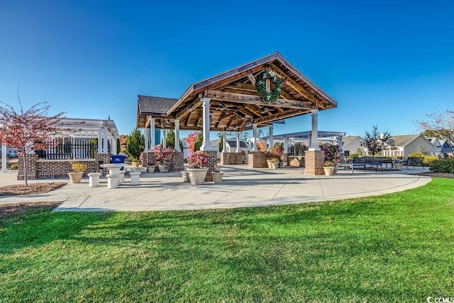 view of home's community featuring a gazebo and a lawn