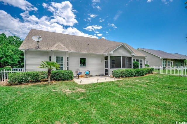 100 Woodlyn Ave, Little River, SC 29566 - rear view of property featuring a patio area and a sunroom