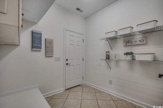 100 Woodlyn Ave, Little River, SC 29566 - washroom with baseboards and light tile patterned floors