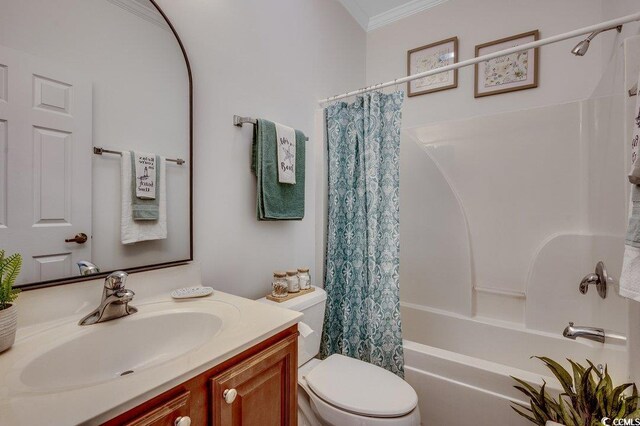 100 Woodlyn Ave, Little River, SC 29566 - full bath featuring ornamental molding, vanity, shower / tub combo with curtain, and toilet