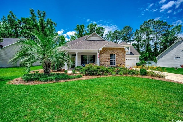 100 Woodlyn Ave, Little River, SC 29566 - view of front of house with a front lawn, an attached garage, and stone siding