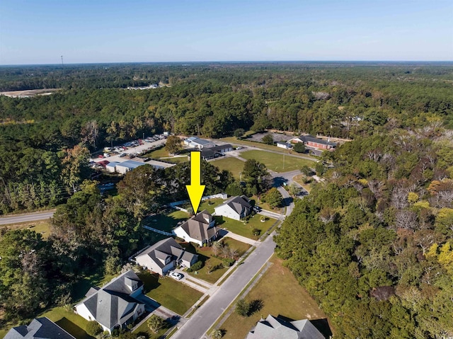 100 Woodlyn Ave, Little River, SC 29566 - aerial overview of property's location with a heavily wooded area