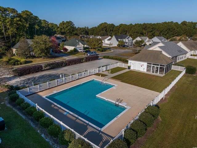 100 Woodlyn Ave, Little River, SC 29566 - community pool with a residential view